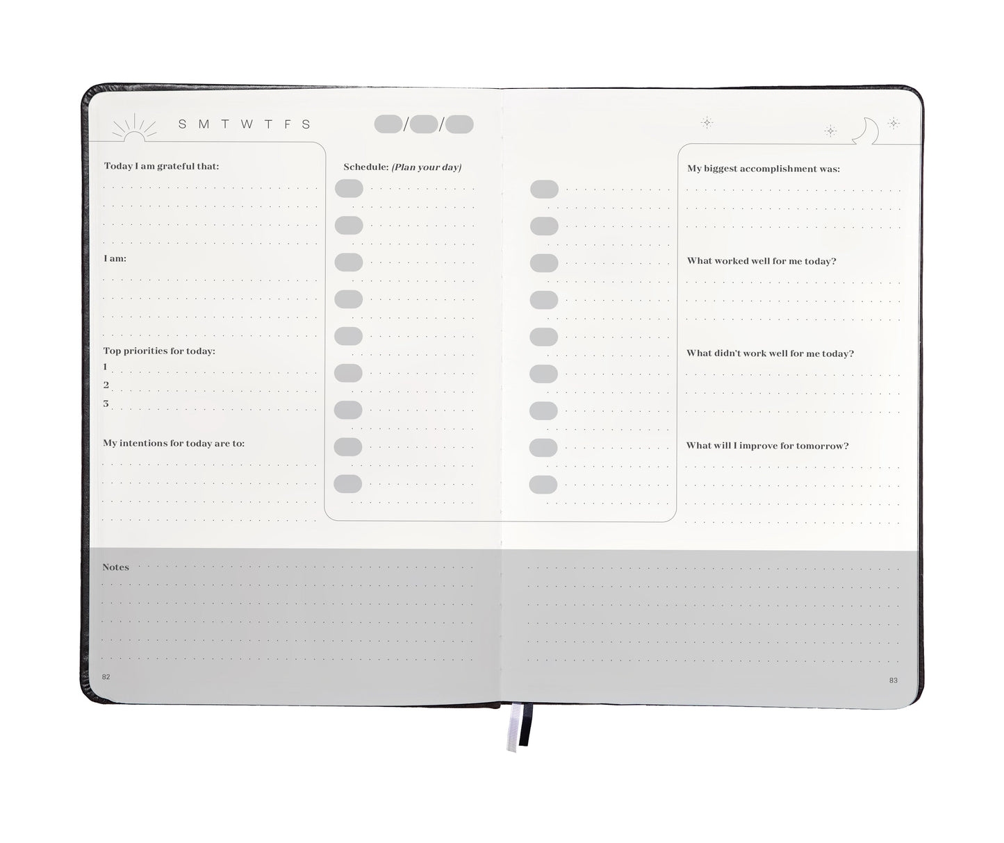 Interior view of the planner showing daily goal-setting pages and weekly reflection sections.